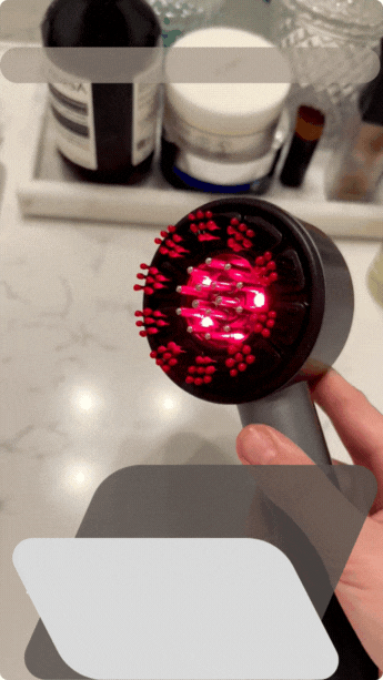 The BloomyLUX™ 4 in 1 SMART SCALP THERAPY BRUSH